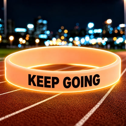 NovaFlow luminous orange wristband with KEEP GOING wording