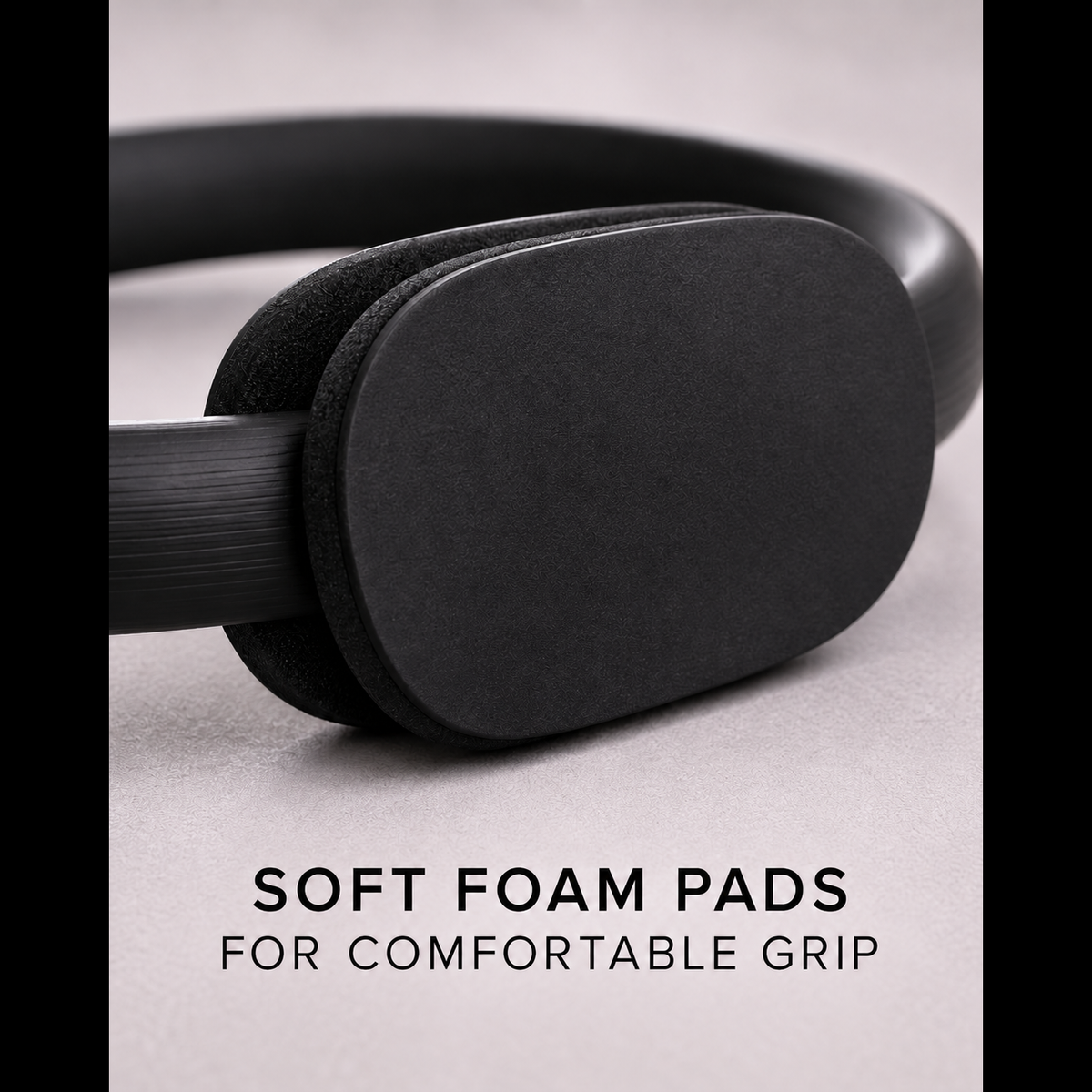 Pilates Resistance Ring unbranded foam handle close-up